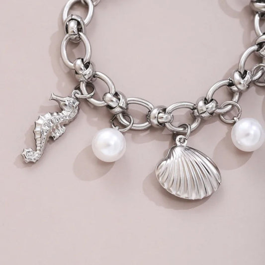 Silver-Tone Ocean Charm Bracelet with Pearl Details - Spencer Vibes