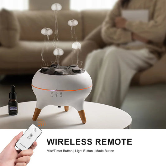 Aromatherapy diffuser with remote control on a table in a living room setting.