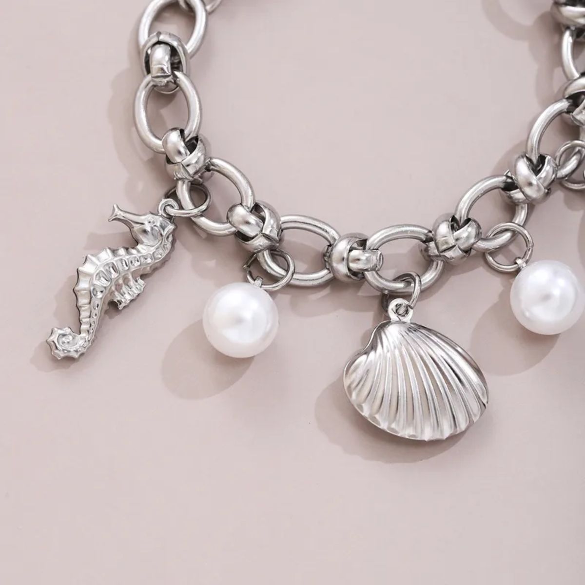 Silver-Tone Ocean Charm Bracelet with Pearl Details - Spencer Vibes