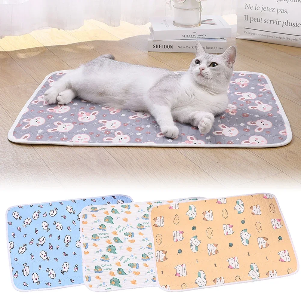 A white and gray cat lounges on a gray mat with white cartoon bunnies. Below are three mats: blue with bunnies, the Summer Breathable Cooling Mat For Dogs featuring green and orange animals, and orange with cartoon cats and dogs.
