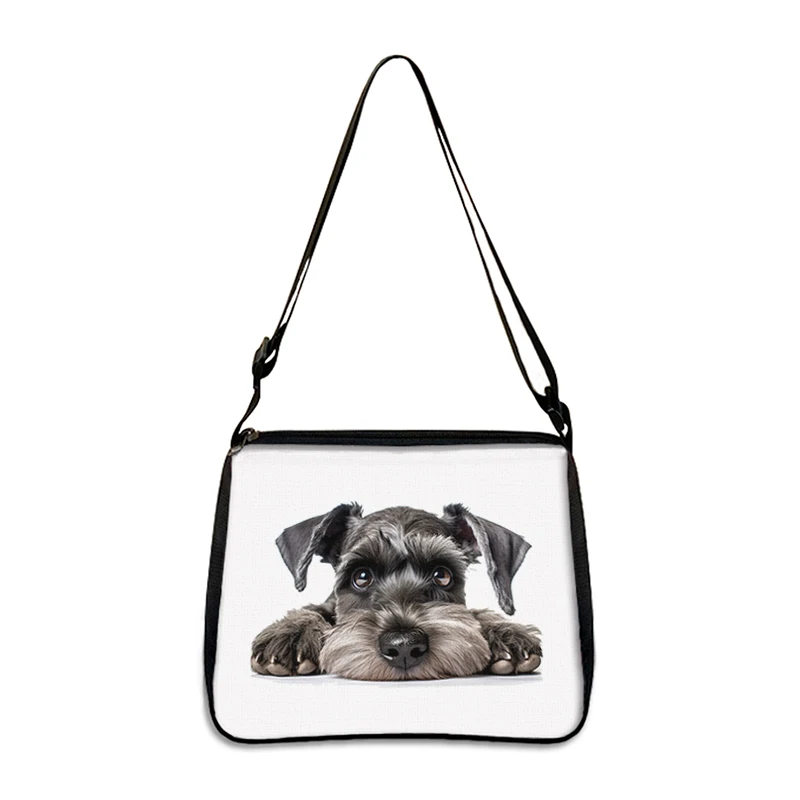 The Cute Prone Dog Shoulder Bag features a realistic dog print with a bulldog, beagle, or pug design. This women”™s crossbody bag has a black strap and trim, making it a perfect portable storage bag and phone holder for dog lovers.