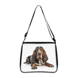 The Cute Prone Dog Shoulder Bag features a Bulldog, Beagle, and Pug print, making it a perfect crossbody handbag and phone holder gift for dog lovers seeking unique canine charm.