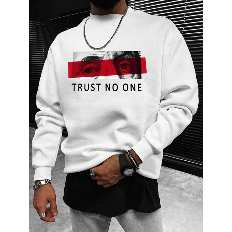 Wearing the Trust No One Funny Sweatshirt, which features bold black-and-white eyes and a red bar with the slogan, a confident individual accessorizes with bracelets and rings against a sleek, modern dark background.