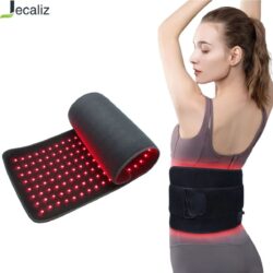 Woman wearing a soft black belt emitting gentle red LED light, creating a warm and calming atmosphere for relaxation at home.