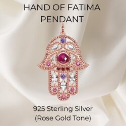 The Hand of Fatima Pendant – 925 Sterling Silver features a rose gold-tone finish with pink, purple, and clear gemstones. Displayed on ivory fabric, this elegant piece exudes timeless charm.