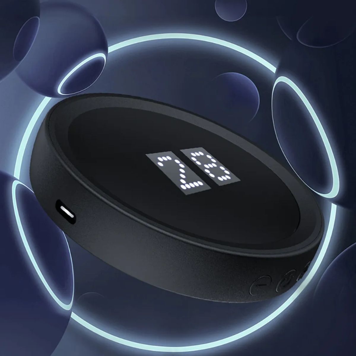 Black circular relaxation sleep aid device with glowing LED numbers on a dark background.