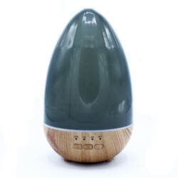 Aromatherapy diffuser with translucent dome and modern teardrop shape