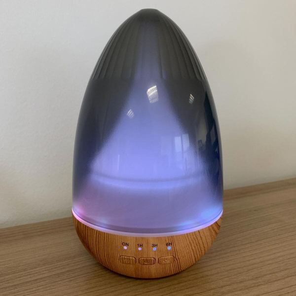 Barcelona essential oil diffuser with smoked dome and wood effect base, showing colour change LED light and teardrop design